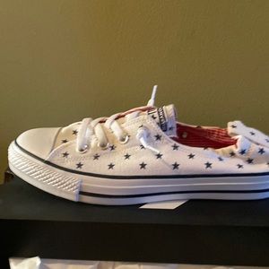 Converse All Star classic white with navy stars slip on shoe . Woman’s size 10